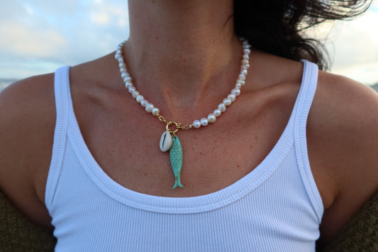 Cowrie Shell and Turquoise Fish on Pearl